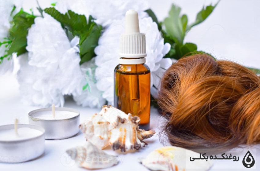 یک شیشه حاوی روغن آرگان دو عدد شمع و همچنین یک کلاه گیس مو