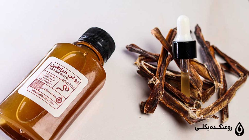 رو7غن خراطین در کنار قطره چکان