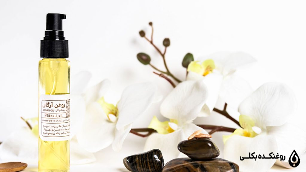 روغن آرگان در کنار گل ارکیده