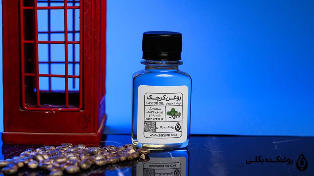 شیشه روغن کرچک روی میز