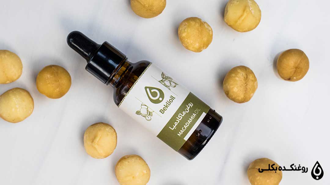 روغن ماکادمیا در کنار مغز ماکادمیا